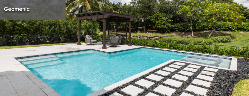 geometric pool with small tanning ledge for pool recliners 